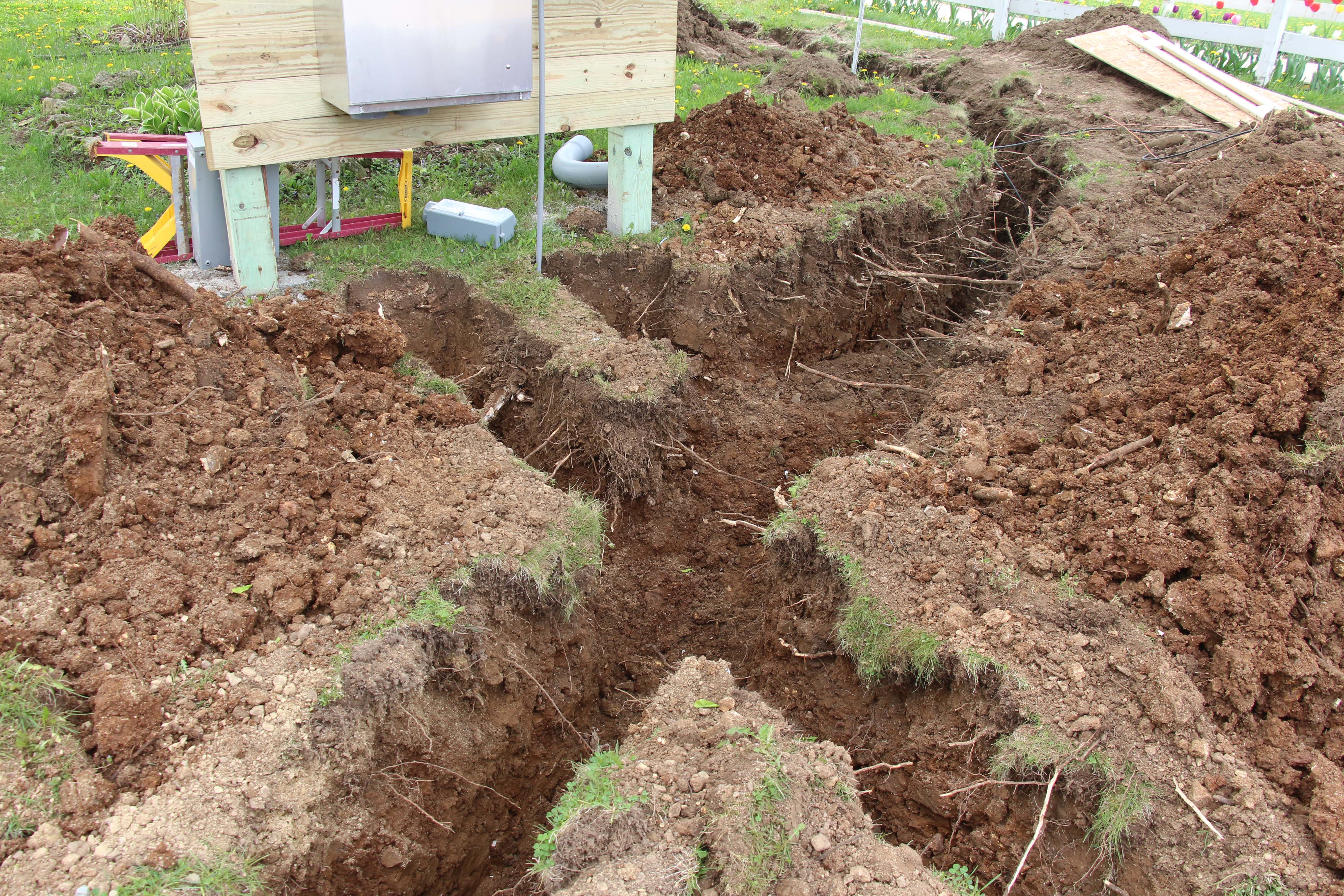 Trenching in front of cabinet